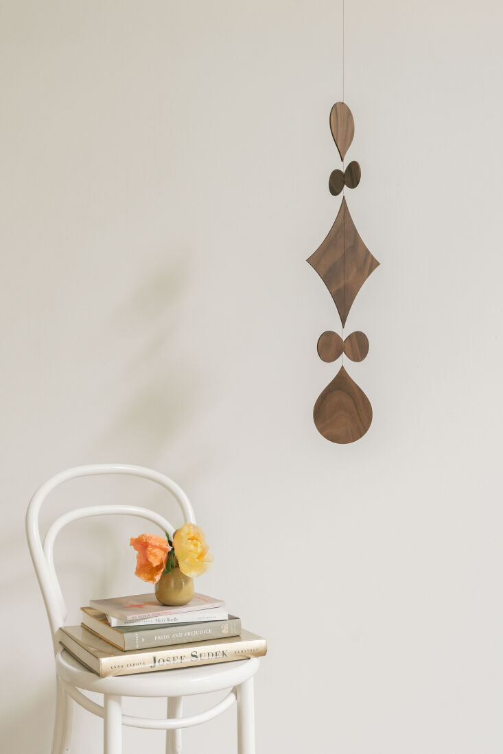 the romeo wall hanging, \$\1\25, can be positioned against the wall or suspende 11