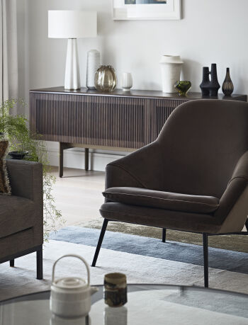 smart relaxed living room with light hardwood flooring, rug, elegant sofas, arm 11