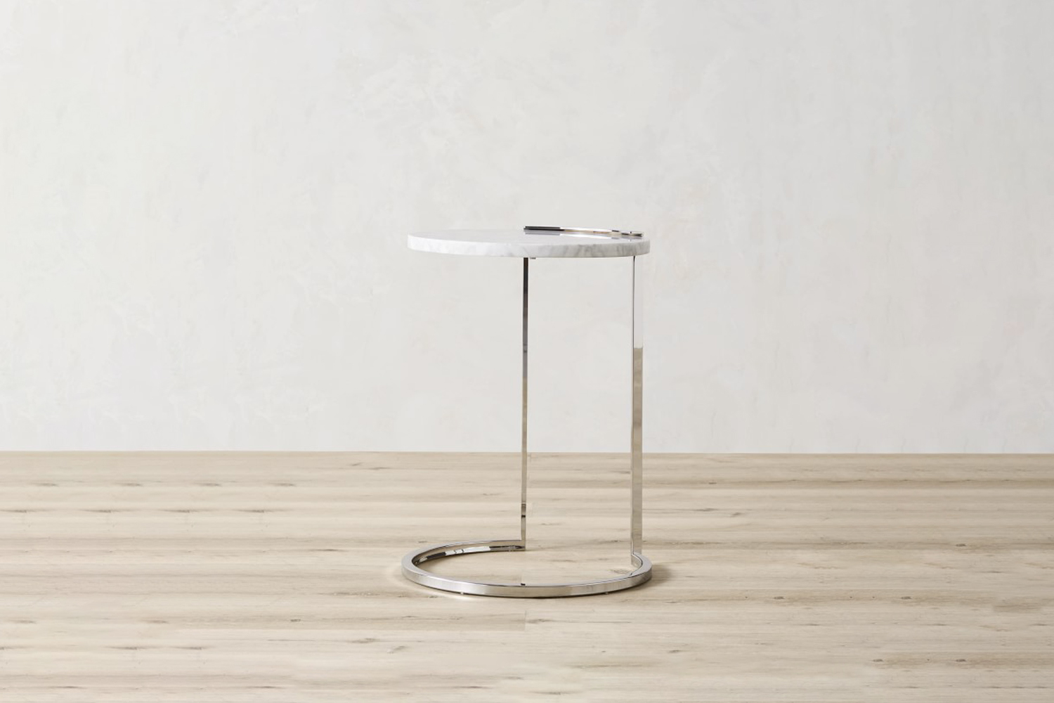 the marble and metal accent table in stainless steel is \$450 at williams sonom 17