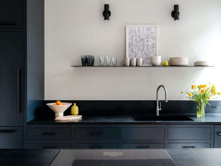 the soapstone, including a custom integrated sink, is from vermont and was sour 10
