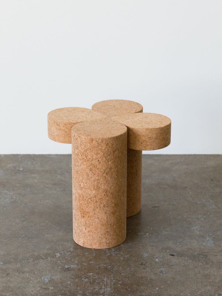 the clover side table, shown here in natural, \$3,075, is part of a new cork co 13