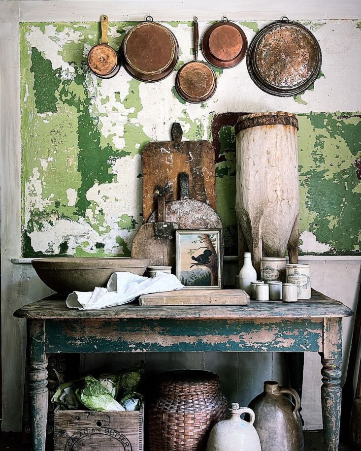 now, the kitchen has perfectly imperfect peeling bottle green walls. 12
