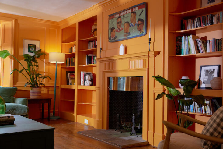 the library walls and joinery are painted bespoke orange. “watching the  17