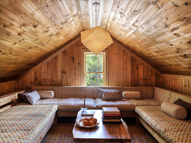 more is more when it comes to wood paneling at little cat lodge. guest room wal 24
