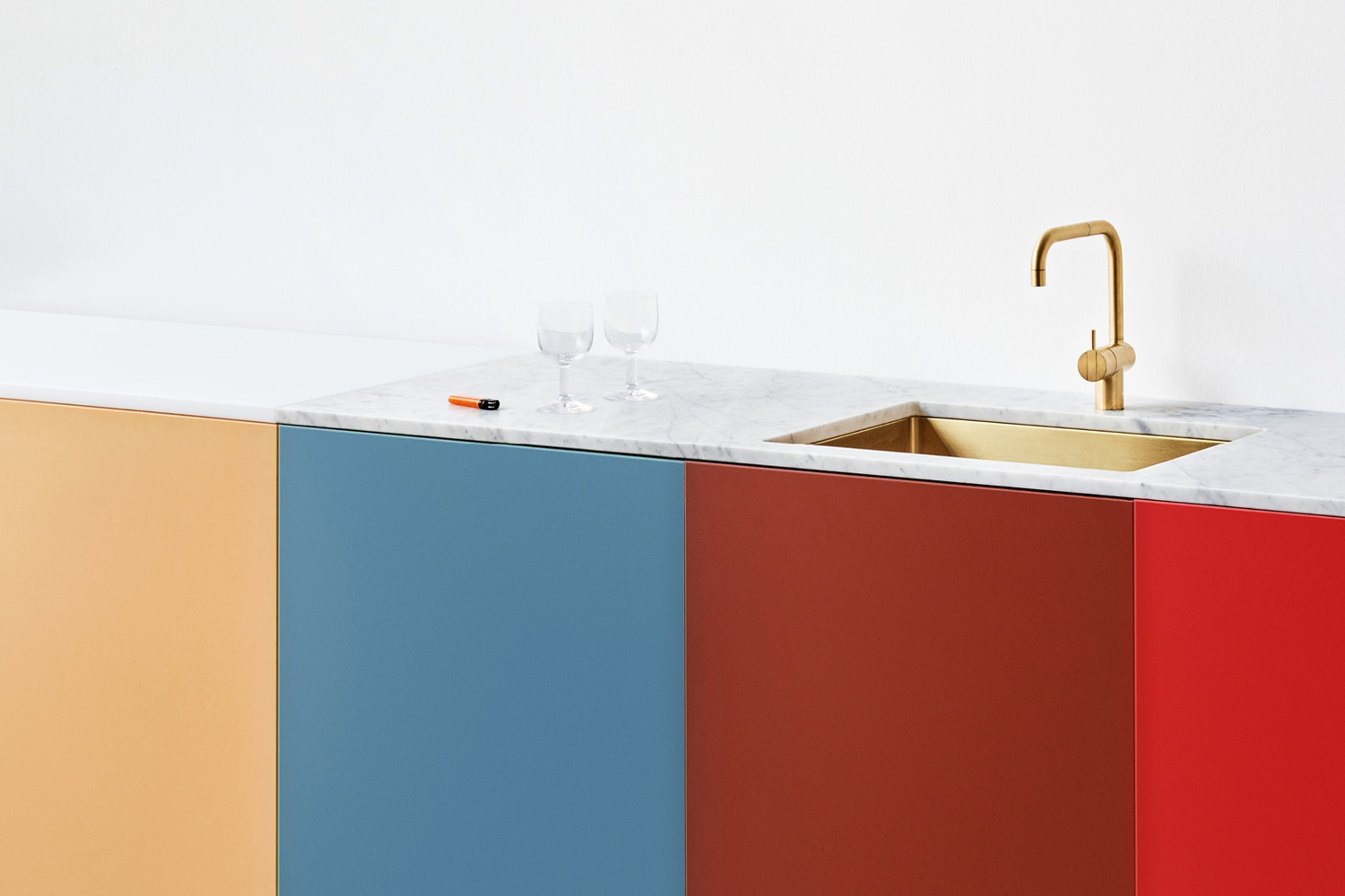 the cabinets are ikea boxes fronted with vibrant doors from reform’s mat 10