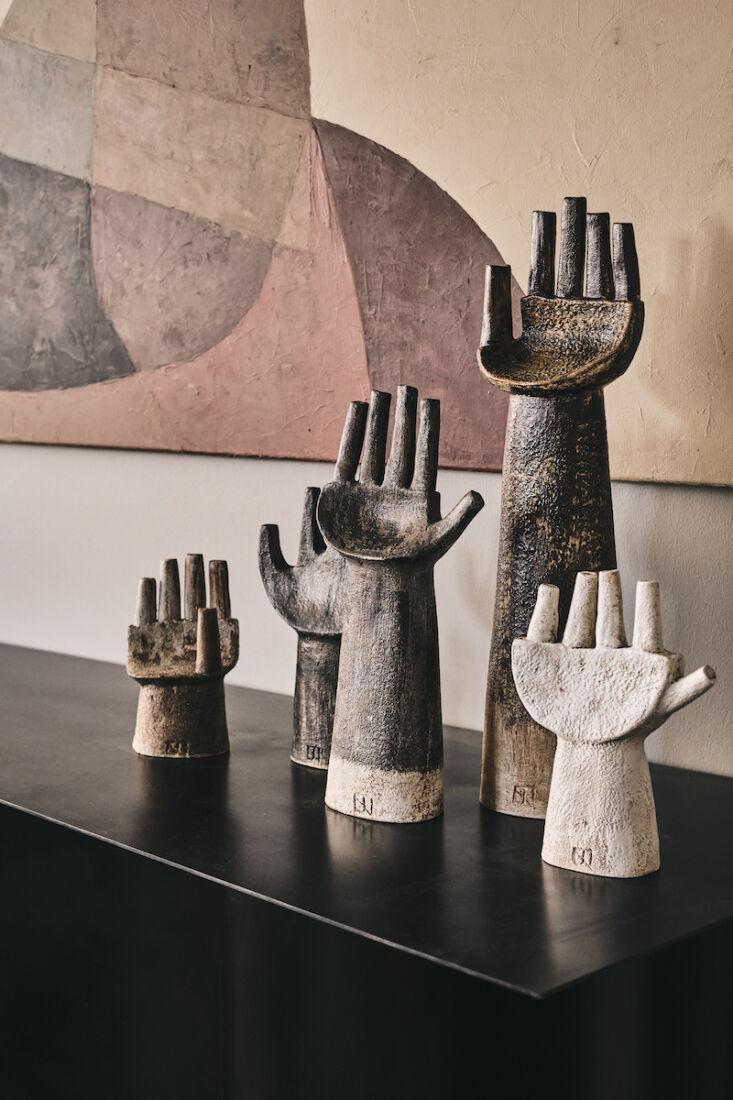 a selection of stoneware hands by the brighton based artist julie nelson. 13