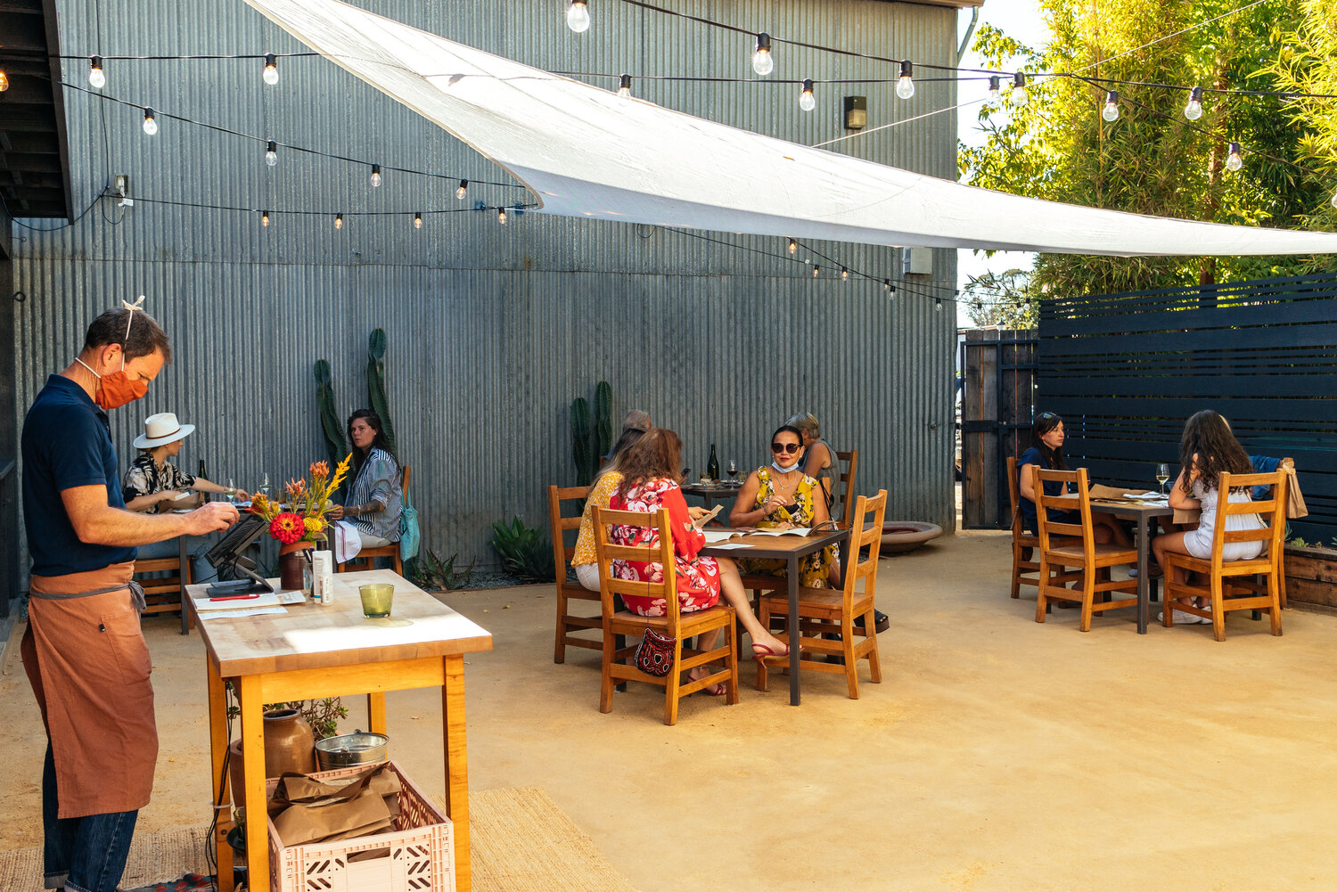 having opened in mid summer \20\20, the back patio served as the primary dining 16