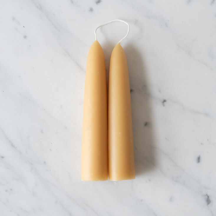 a pair of  wide beeswax tapers made in winnipeg, canada, is \$38.50, from  12