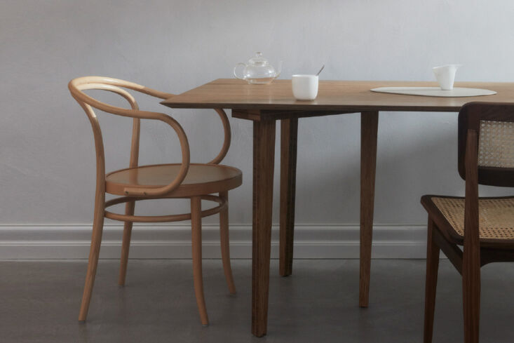 the dining table is the ask og eng a4 dining table, also made from bamboo, in t 18