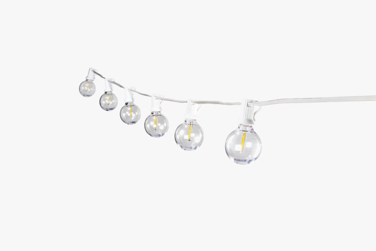 Similar string lights are the Bistro LED String Lights in white; $69 at Pottery Barn.