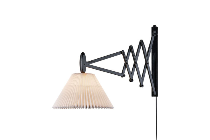 our sleuthing revealed that the light is the sax light, designed by erik hansen 11