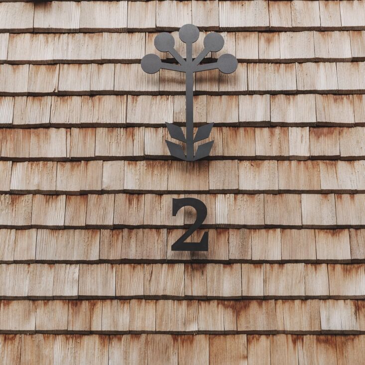 an alpine motif marks each entryway. 18