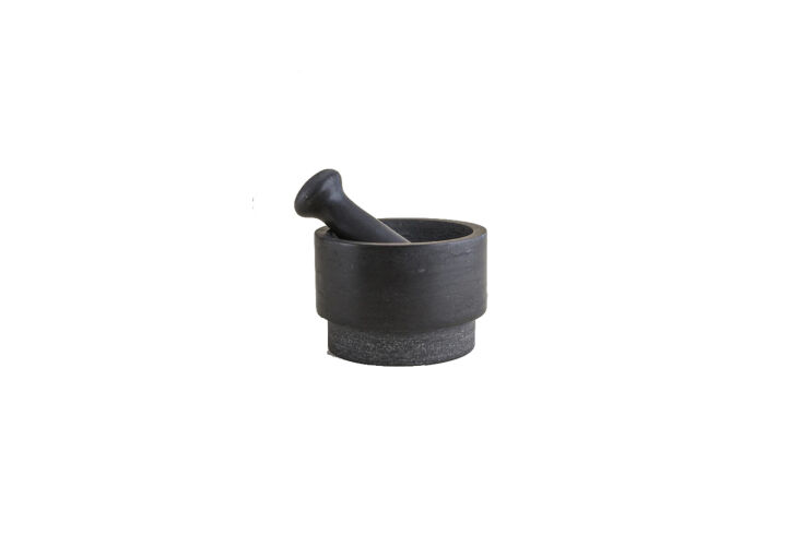 a similar black stone mortar and pestle is the pila marble mortar set; \$\187 a 28