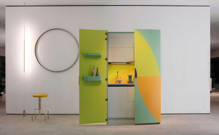 the compact but no less vibrant am 01 kitchen, designed by atelier mendini for 9