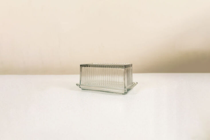 the pressed glass butter dish is \$\17.99 from 80 acre market. 25