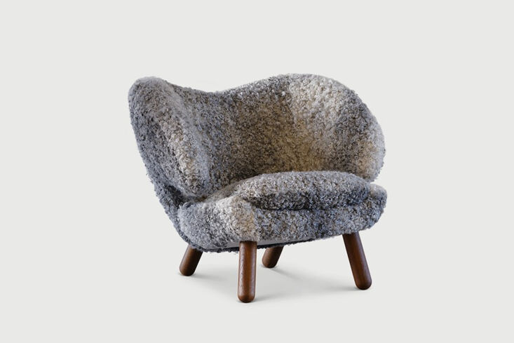 a similar version to the grey shearling upholstered chair is the original finn  15