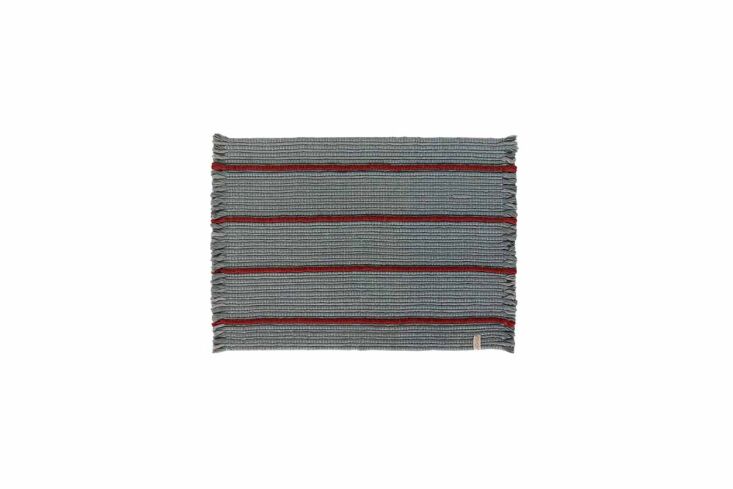 the pukti recycled doormat, shown in dusty blue, is \$6\2. 15