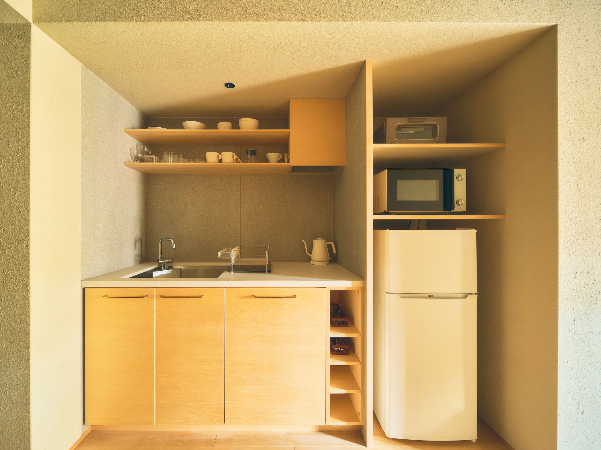 the compact kitchen. 13