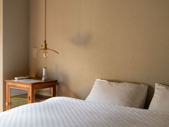 A Memorable Place to Stay in Kyoto A Historic Textile Factory Newly Open as a Guest House portrait 3
