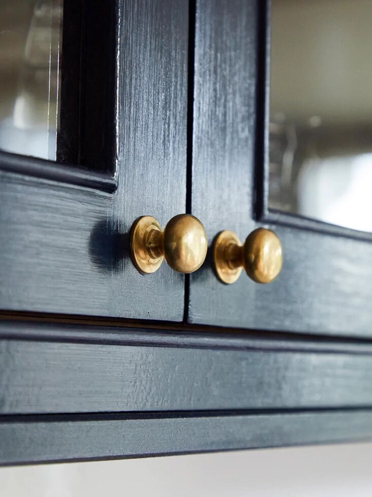 the button, made from un lacquered, lightly antiqued, solid brass (£36). 10