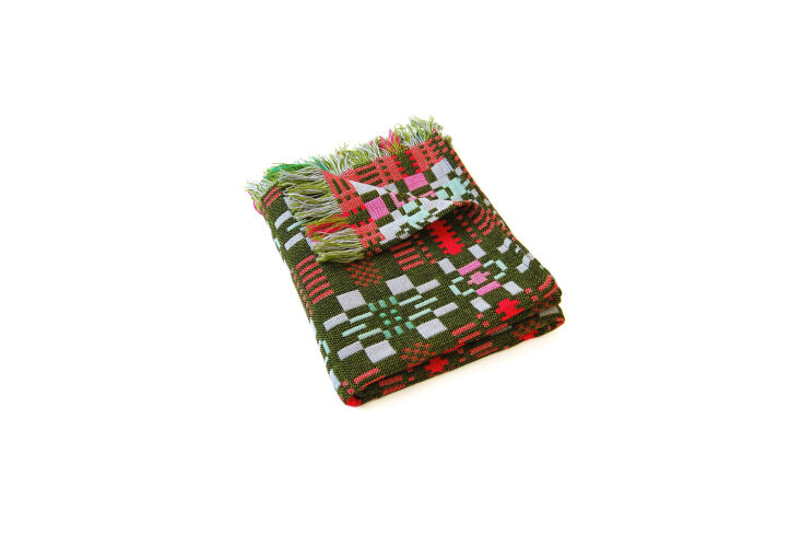 designed by donna wilson for scp, the nos da throw in moss is £\279 at scp. 16
