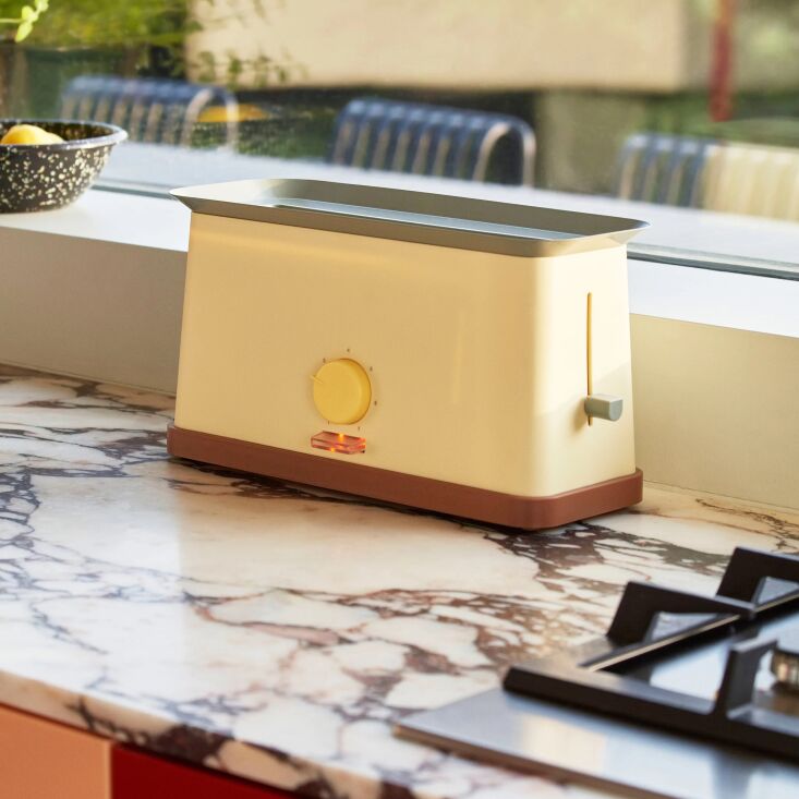 the toaster in a sunny palette. the flat top doubles as a warming area: &#8 10