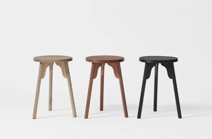 ifuji’s three legged walnut stools are available in three finishes  12