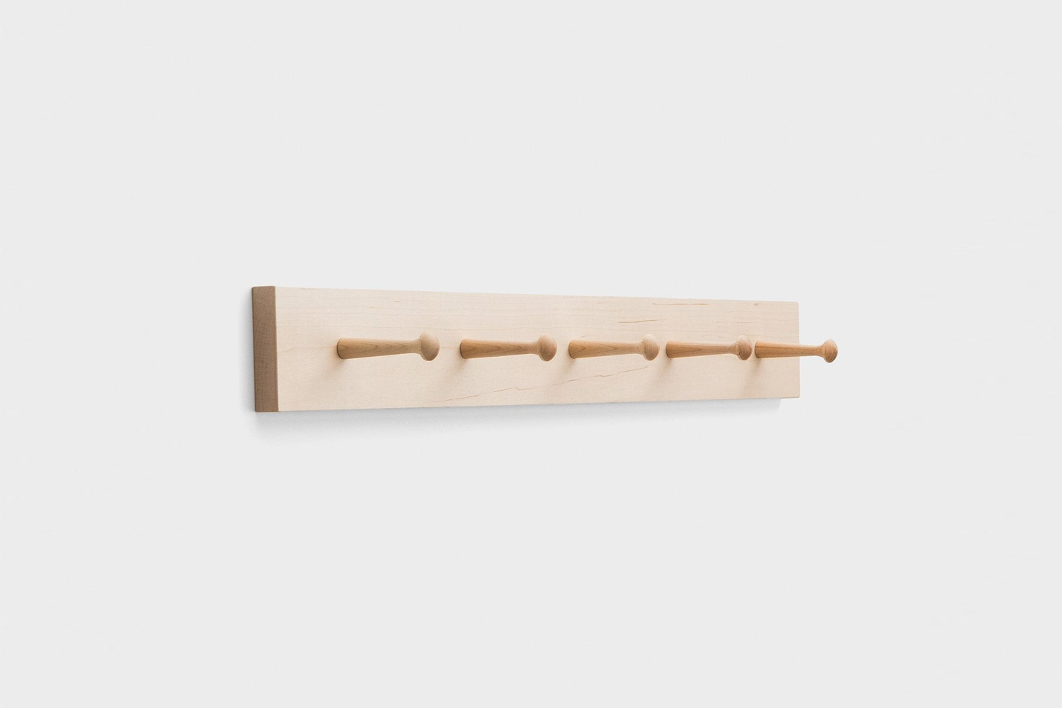the maple peg rail features five pegs; \$84 at schoolhouse. another option is t 17