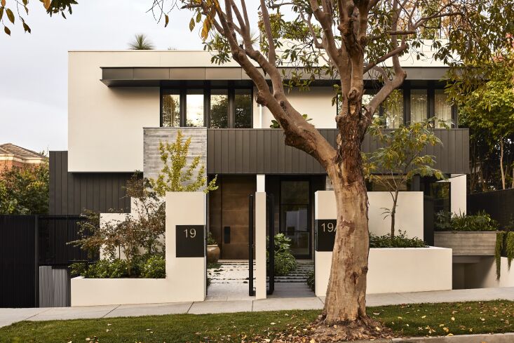 The family lives in the right half of the double terrace house. Brem says his client &#8220;was particularly drawn to the clean architectural lines of modernist architectural heavyweights like Mies van der Rohe.&#8221;
