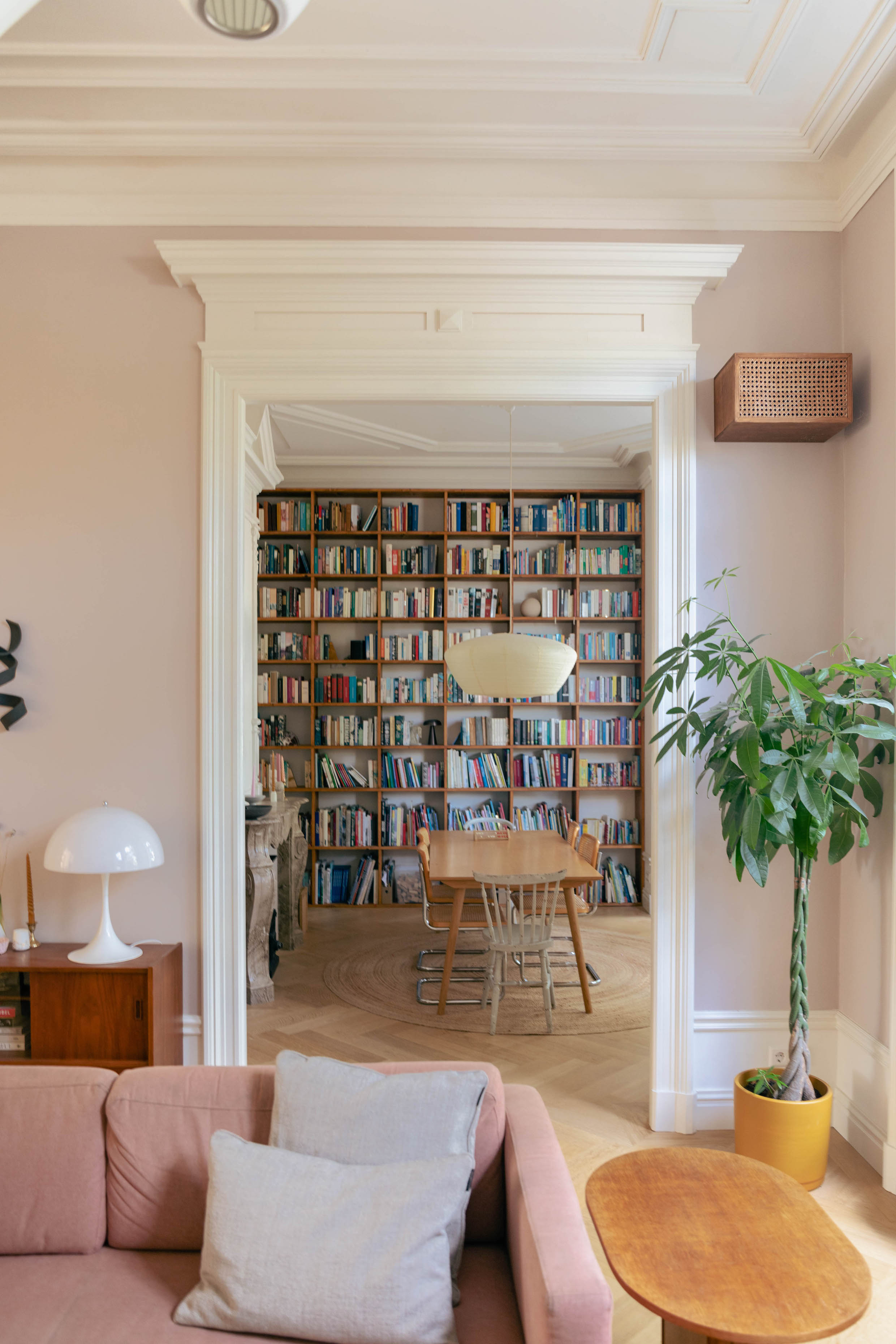 a newly widened entry opens the living room to the library, the family&#8\2 13