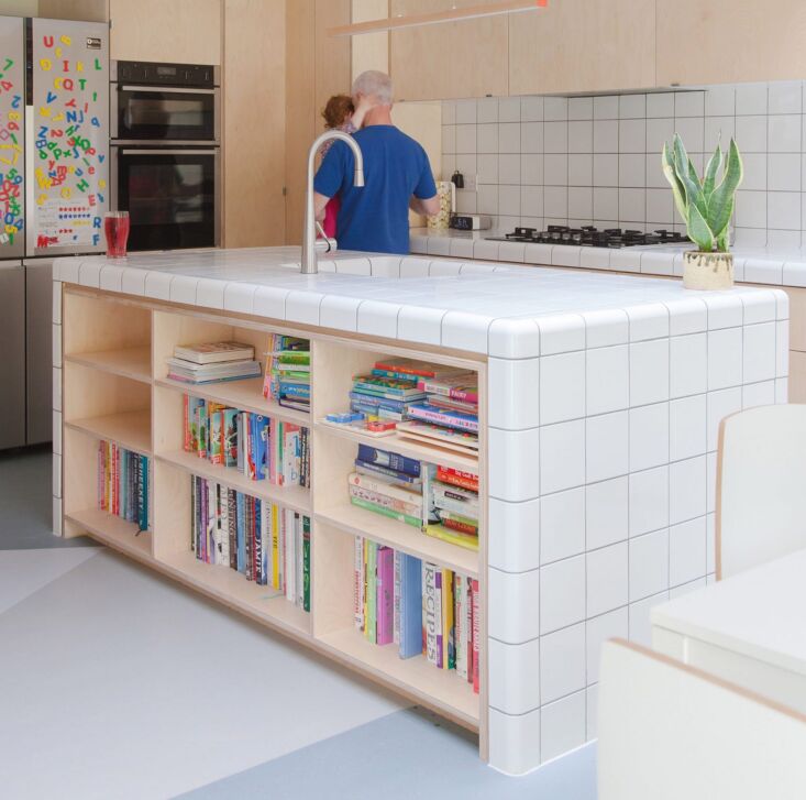 this kitchen island in london by nimtim architects features white tiles by dtil 22