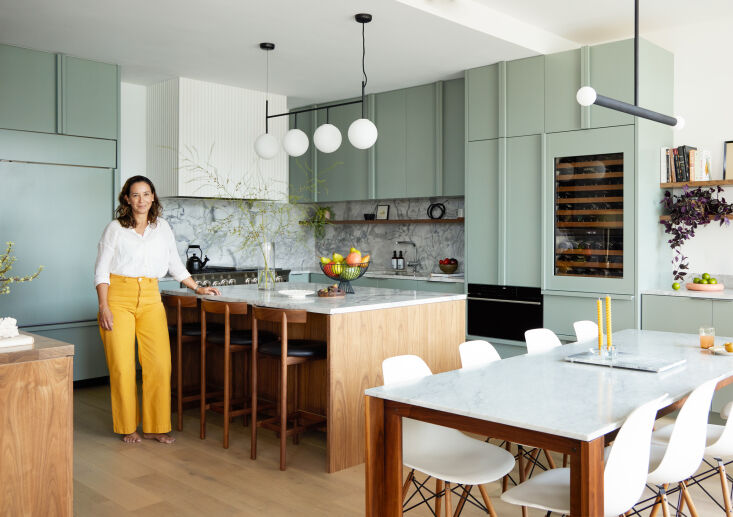 ana in the redone kitchen. though the couple are not designers—ana is a  9