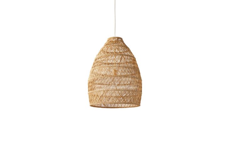 the woven pendant light in the tent is equipped with a hanging candle rather th 20