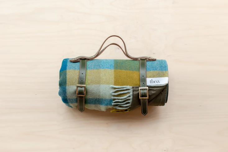 the recycled wool picnic blanket (shown here in teal patchwork check) is design 15
