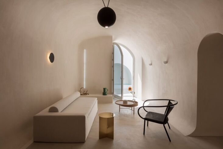 a modern take on the cave trend, this santorini summer house, by kapsimalis arc 16
