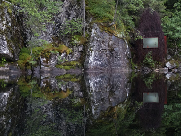 A Place to Gaze at Natures Cinema A Hidden Lakeside Hut in Norway portrait 3