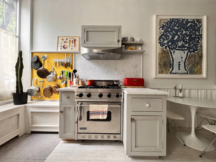 the resulting color palette of the compact nyc kitchen is a cool gray white wit 14