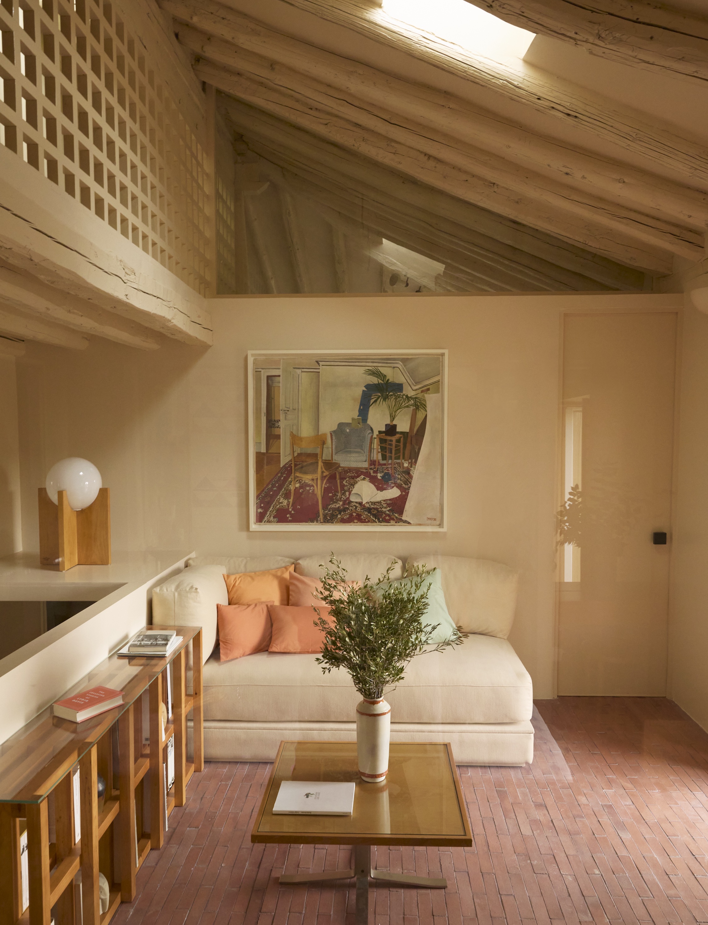 a central lounge/reading area divides the two upstairs bedrooms. the painting o 26