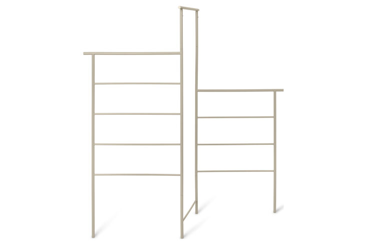 the ferm living dora clothes stand is available in cashmere (shown) and black;  17