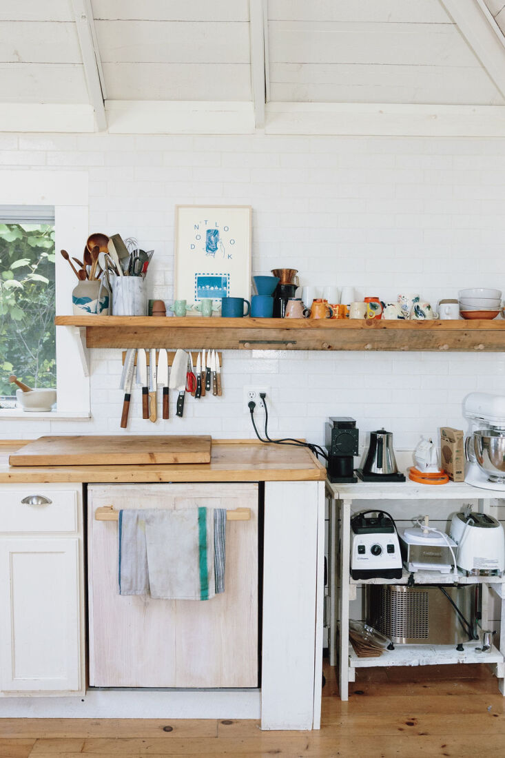 on the wall shelf is marjory&#8217;s collection of favorite cups and dish 15