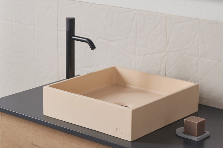 the mudd concrete yarra lg sink is shown in peach but is available in a wide ra 21