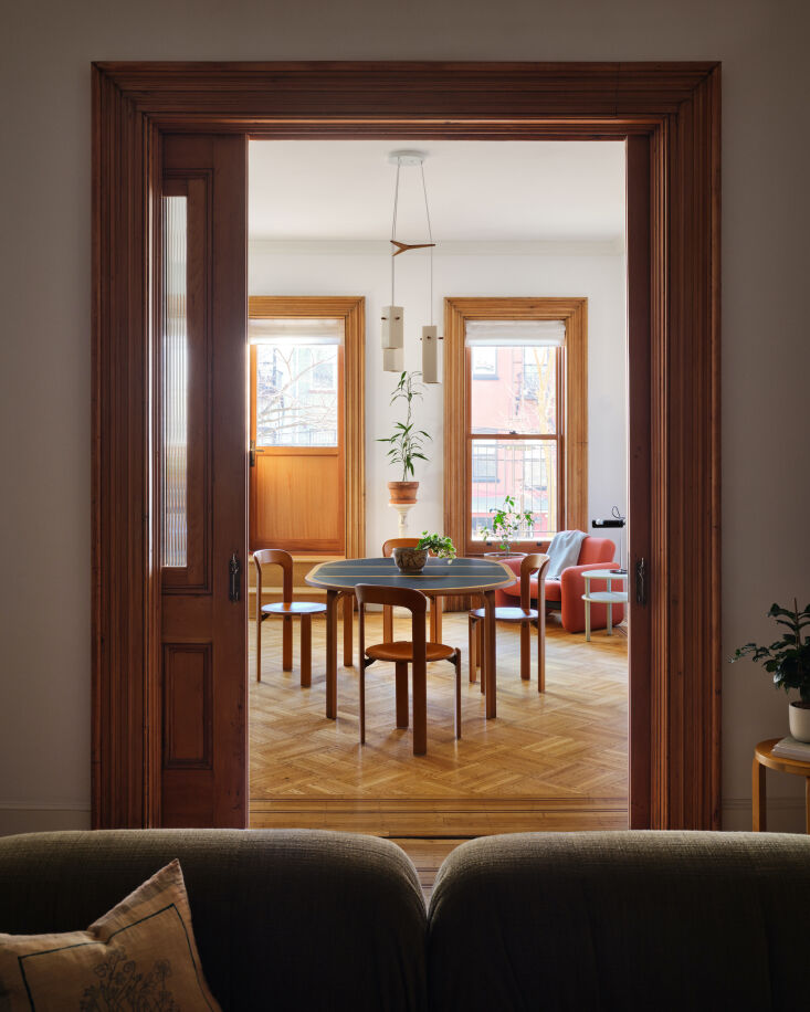 the pocket doors leading to the dining room are original, albeit with new flute 17