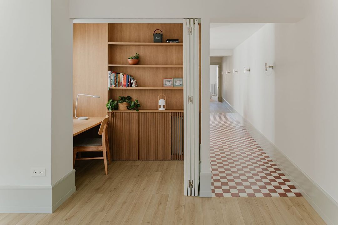 a checked hall connects this pocket home office to the kitchen in a la rioja, s 17