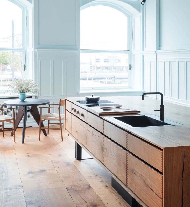 oak planks heartoak mejlborg aarhus dinesen showroom kitchen induction 1