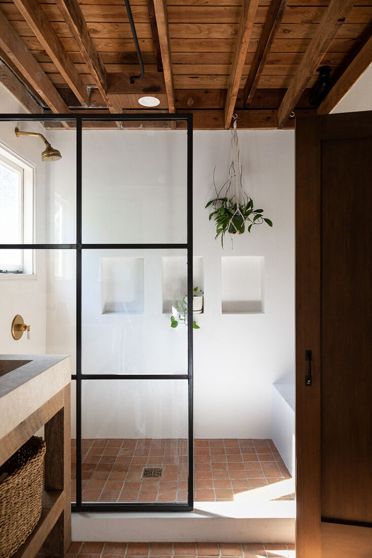 sarah designed the massive standing shower, with its roomy bench and trio of ni 21