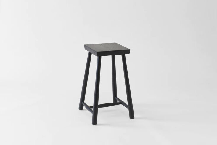 the bcmt co black low rung counter stool is made of blackened white oak; \$8\20 14