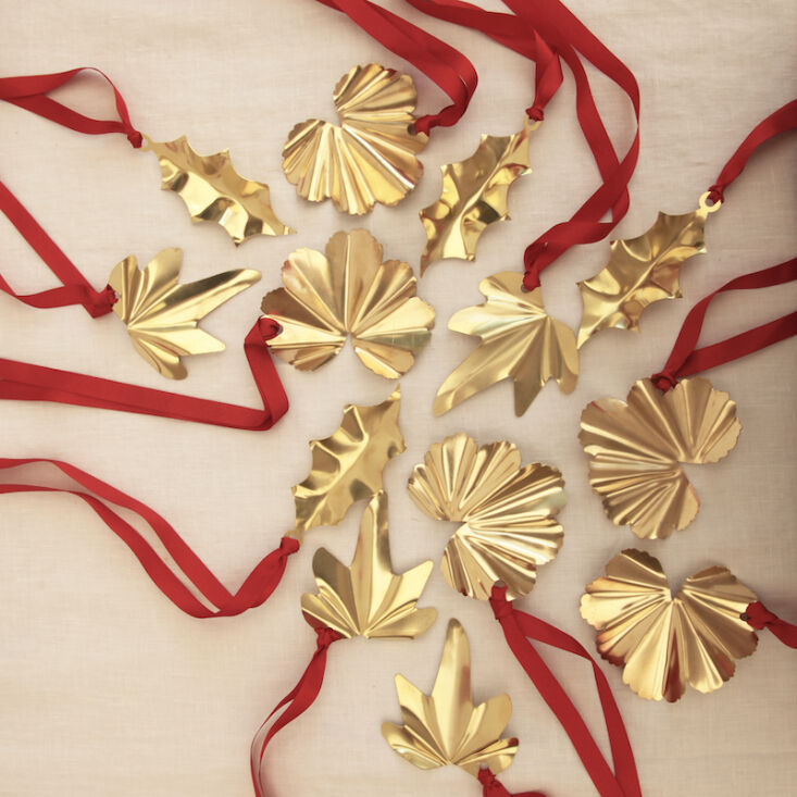 jess&#8217;s brass christmas decorations on red ribbon: alchemilla, holly 24