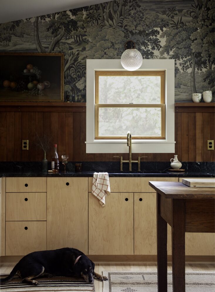 the clear coated maple veneer plywood cabinets were made by boxco studio, a sus 20