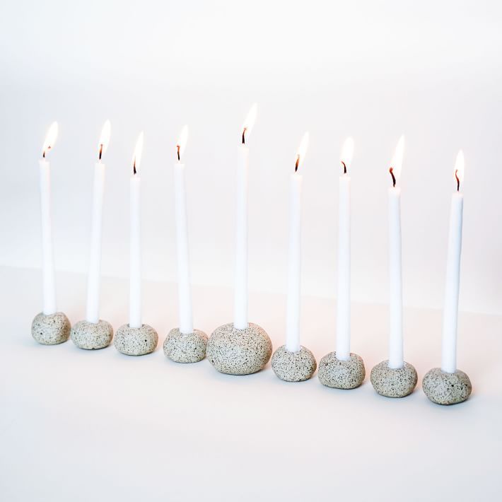 the keraclay stoneware menorah set from west elm, \$68, is handmade from speckl 16