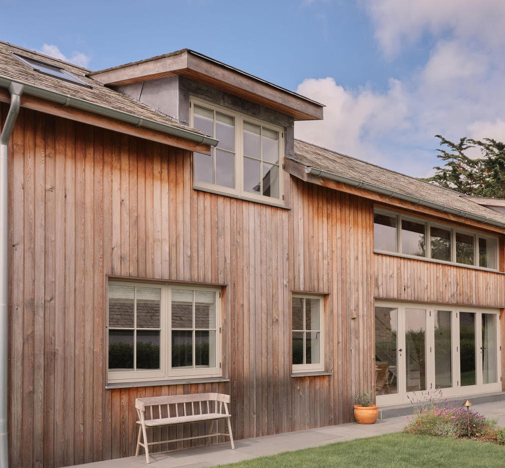 constructed in nine months on a tight budget, the house is clad in larchâ 15